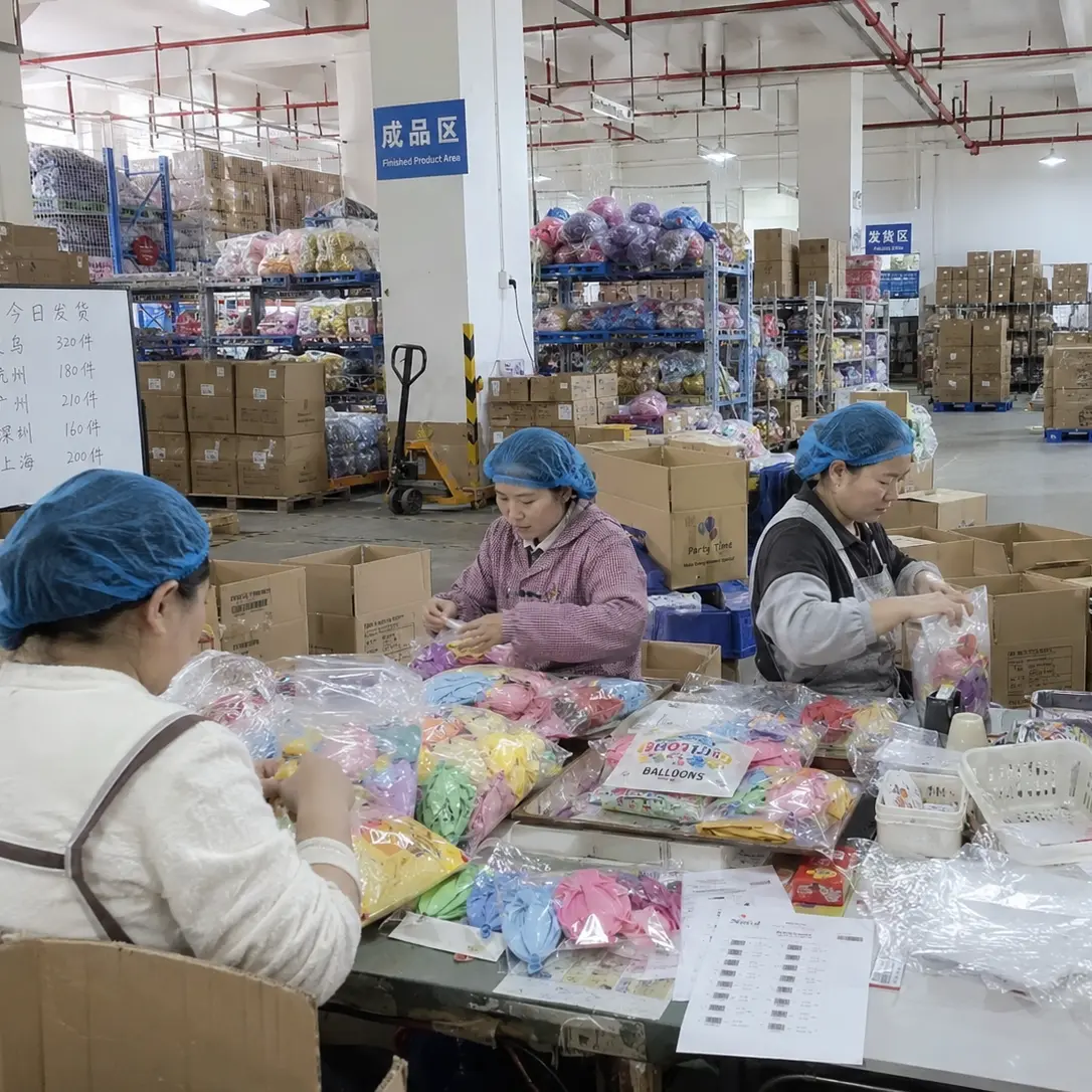 Workers sorting and packing balloon products at Borun Balloon Factory in Xiongxian China